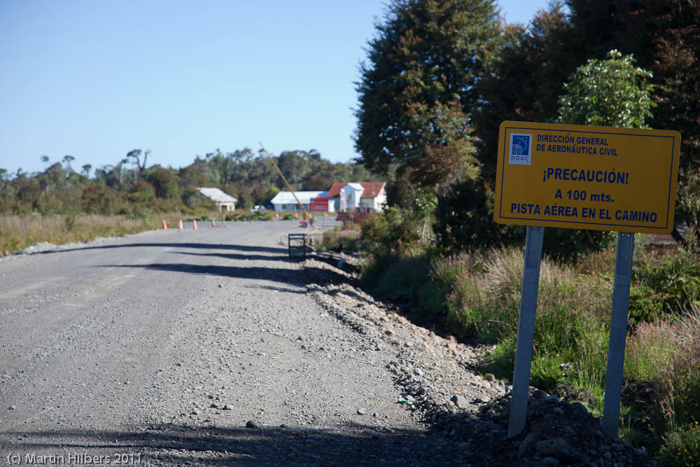 Carretera Austral: 09/01 Chaiten - Caleta Gonzalo / Chaiten airport - landing strip shared with the road. Click to see full size image