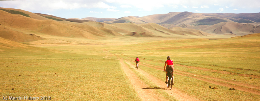 Mongolia: 12/6 Khangai Mountains Pass - Erdenetsogt / Descending towards camp. Click to see full size image