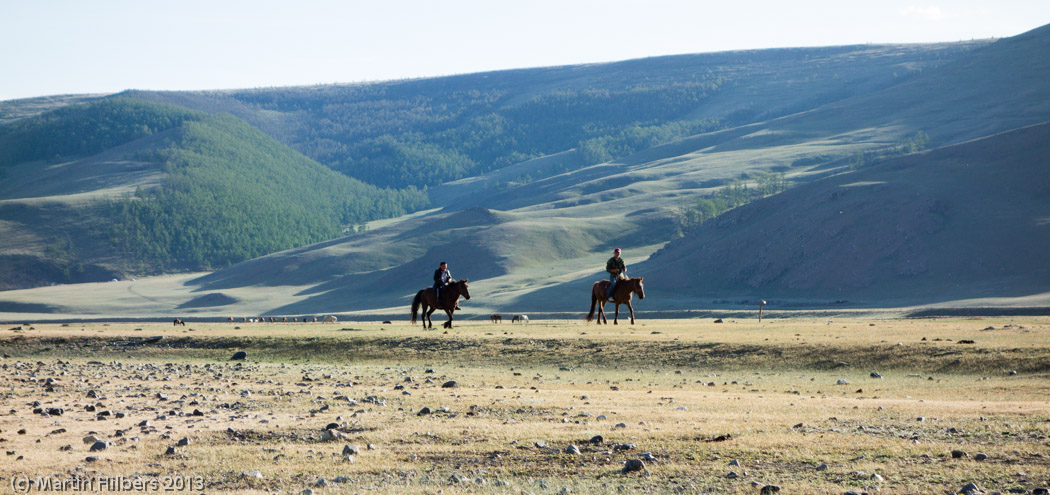 Mongolia: 10/6 Tsetserleg - Kumirnya Tusukhaley / Curious locals at camp. Click to see full size image